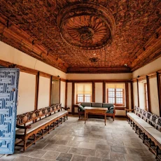 a-large-ornately-decorated-room-with-stone-floori-2025-02-03-05-19-36-utc